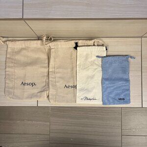 Aesop drawstring dust bags and more